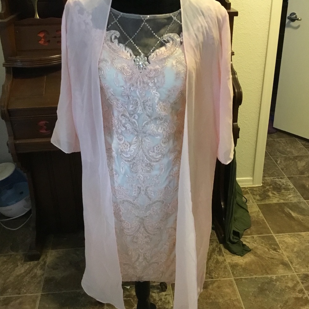 Beautiful hand beaded lace dress with cover.